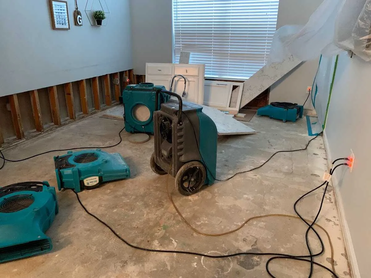 Dehumidifier in flood-cut room for Water Damage Restoration in Sugar Hill